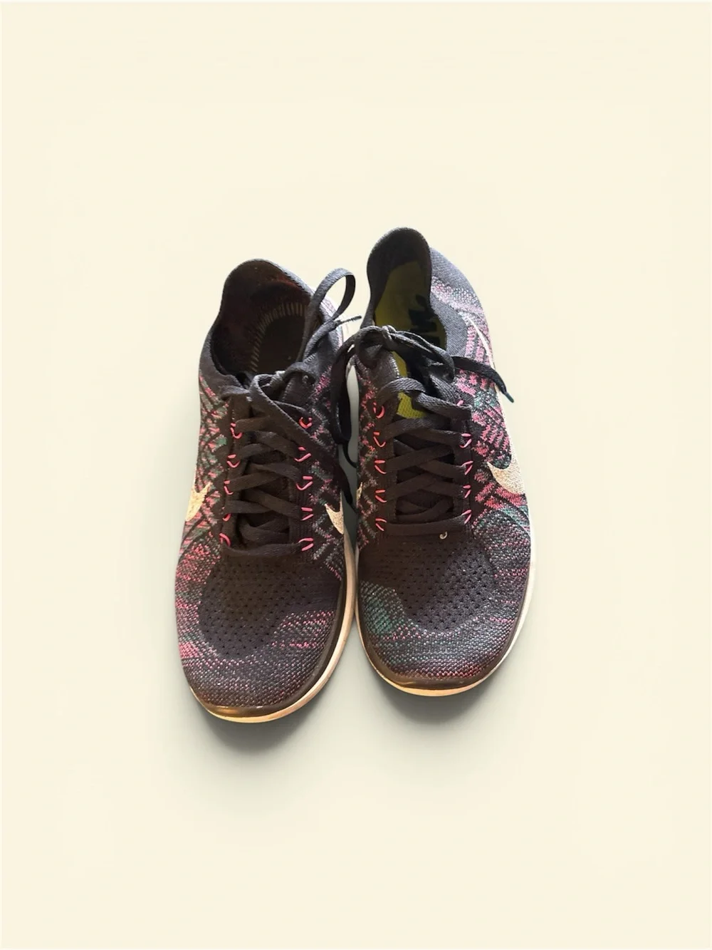 Nike Women's Black Knit Sneakers with Pink and Teal Accents